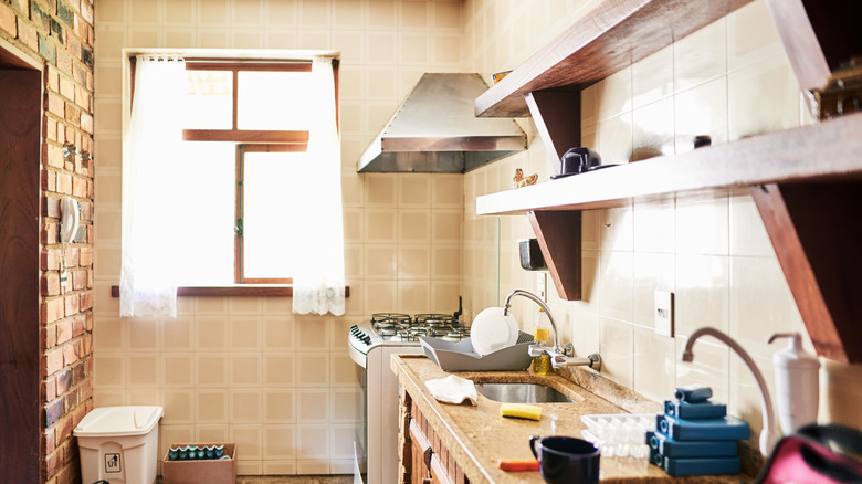 A small kitchen with clutter