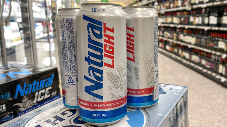 Cans of Natural Light Beer on display in store