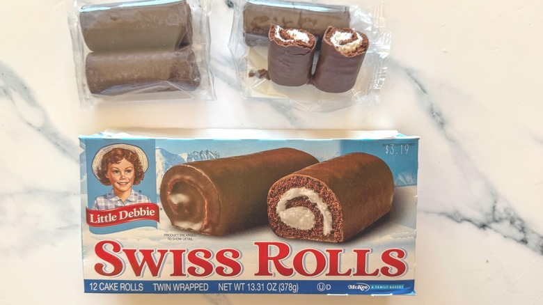 Swiss Rolls on marble surface