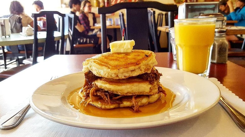 A plate of Pulled Pork Pancakes at Red Wagon Cafe in Vancouver