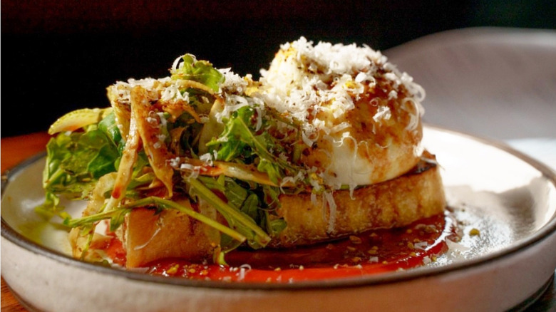 The burrata from Customshop, piled high with arugula and smothered in sauce
