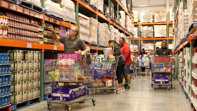 Shoppers in Costco aisle