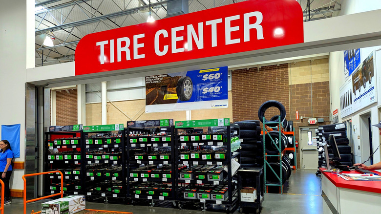 Inside of Costco's tire center with various tires lined up