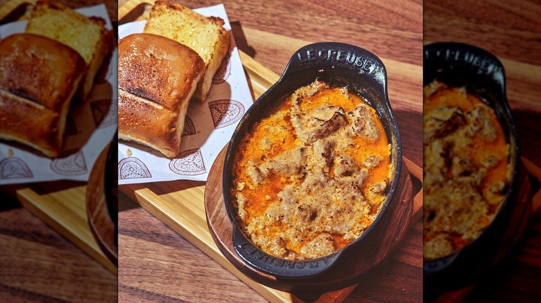 Indian cuisine on wooden table background