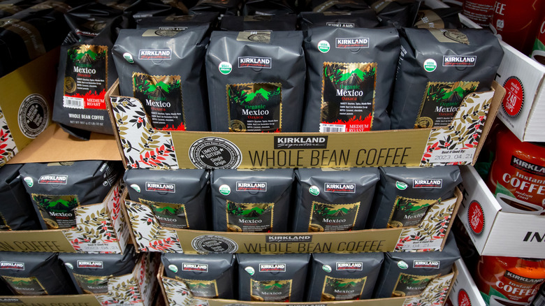 Packages of Kirkland Signature Organic Mexico Oaxaca Medium Roast Whole Bean Coffee at a Costco warehouse