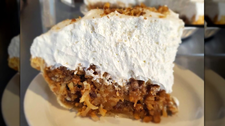 closeup of sawdust pie with whipped cream