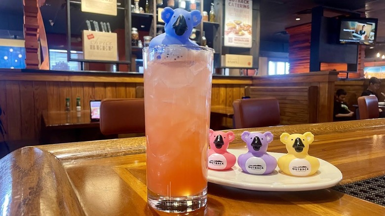 Outback Steakhouse's Koala Punch cocktail with rubber koala toys in various colors