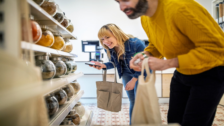 People shopping in the spice aisle