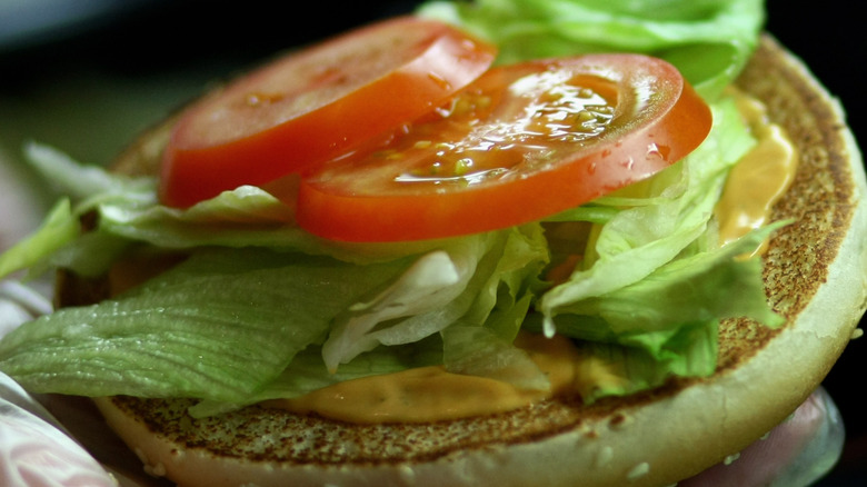 tomatoes on a burger patty