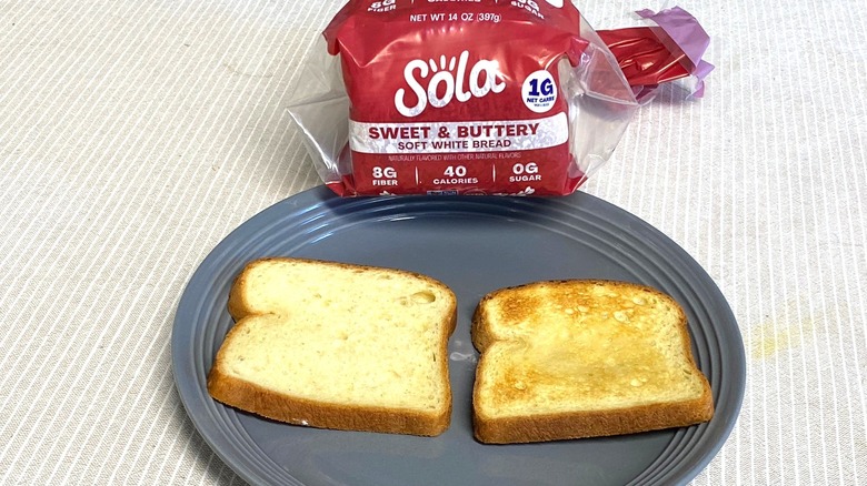 Sola Sweet & Buttery Sliced Bread with two slices on a plate.
