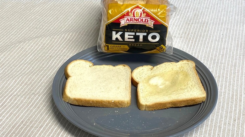 Arnold Superior Keto Bread package and two slices on a plate.
