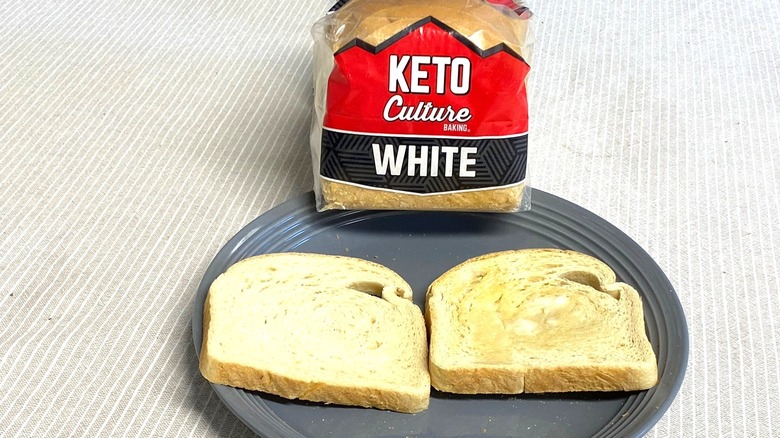 Keto Culture bread and two slices on a plate.