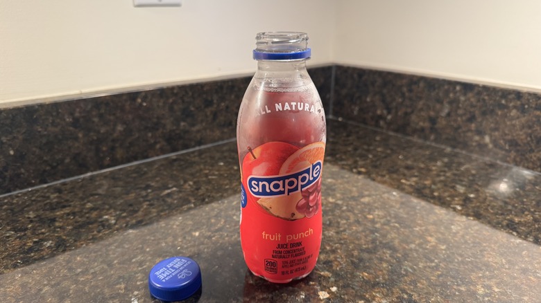 Fruit Punch in a bottle on a surface