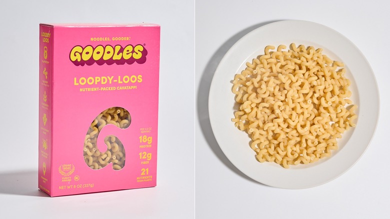 Box of goodles next to a plate of cooked pasta