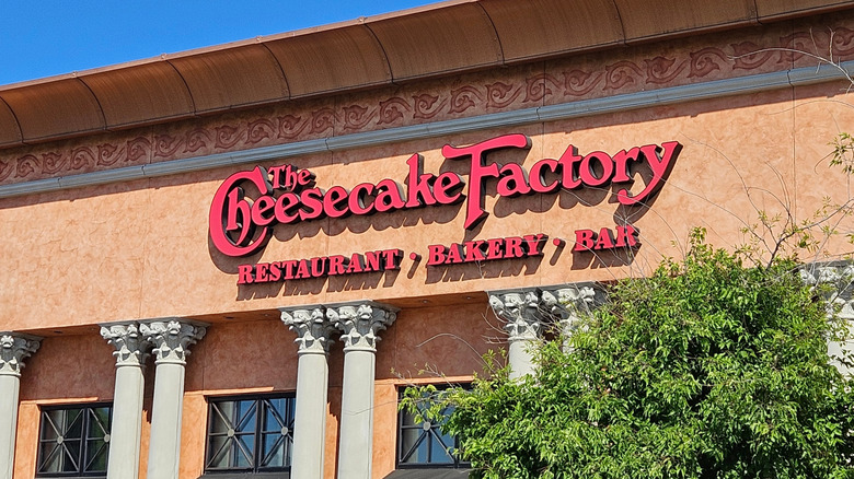 The Cheesecake Factory sign on a building