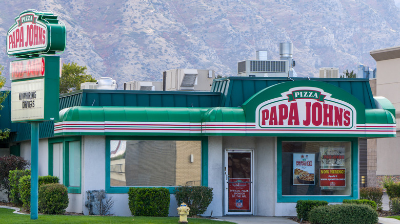 Papa John's location in front of mountain range