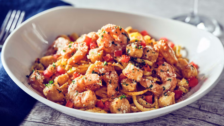 A plate of scallops and shrimp scampi at Bonefish Grill