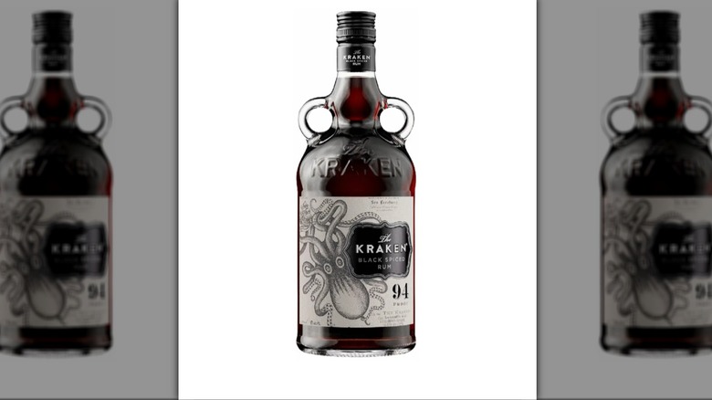 Bottle of Kraken black spiced rum on a white background