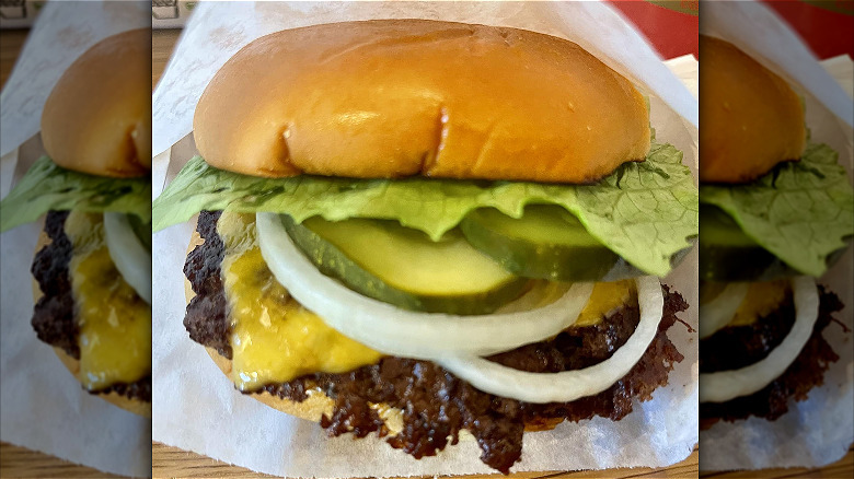 Shake Shack burger with pickles and onions