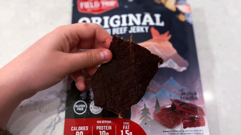 A strip of Field Trip jerky against its package