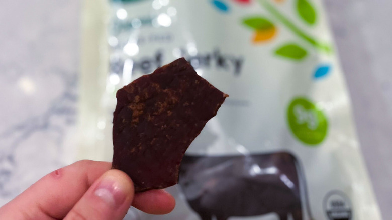 A strip of 365 Whole Foods Market jerky against its package