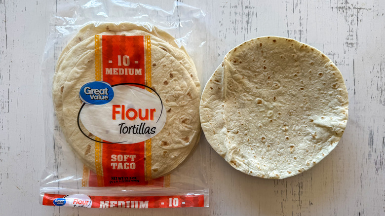 Tortillas on surface with plate