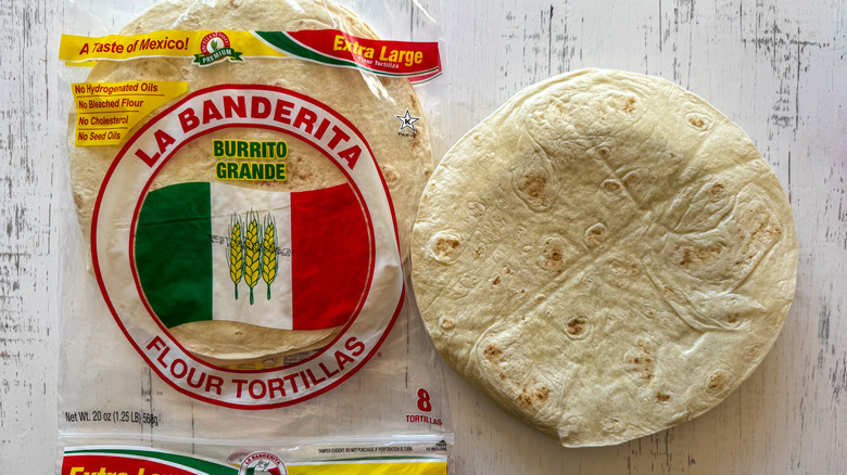Tortillas on surface with plate