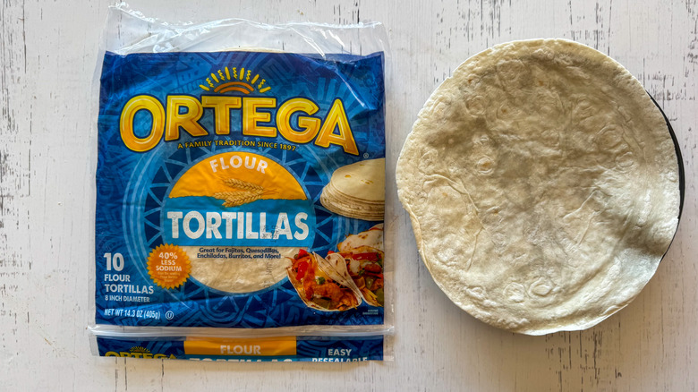 Tortillas on surface with plate