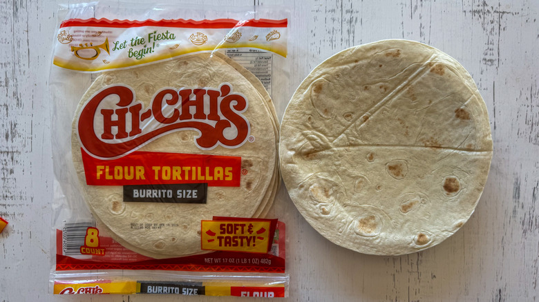 Tortillas on surface with plate