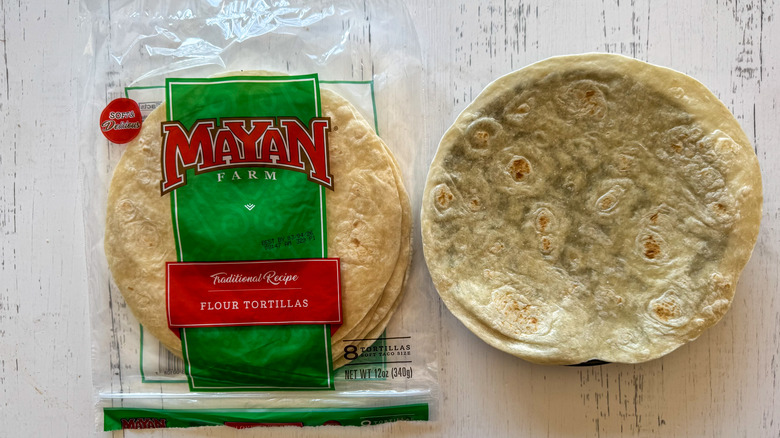 Tortillas on surface with plate
