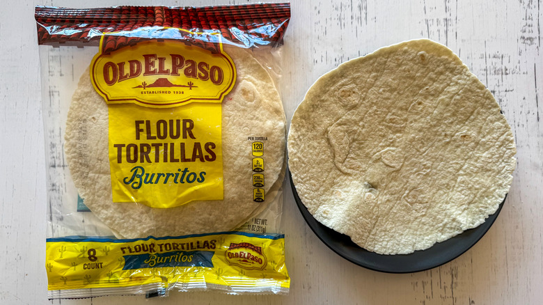 Tortillas on surface with plate