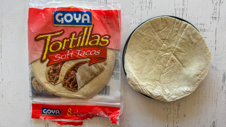 Tortillas on surface with plate