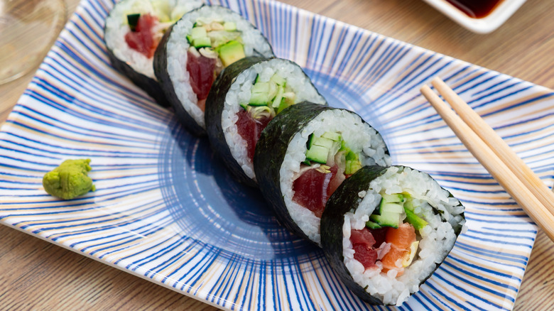 a futomaki roll filled with a variety of ingredients