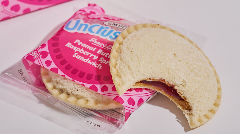 A raspberry jelly Uncrustable on a table