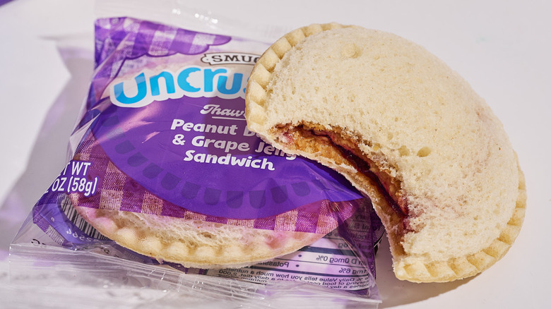 A grape jelly uncrustable on a table