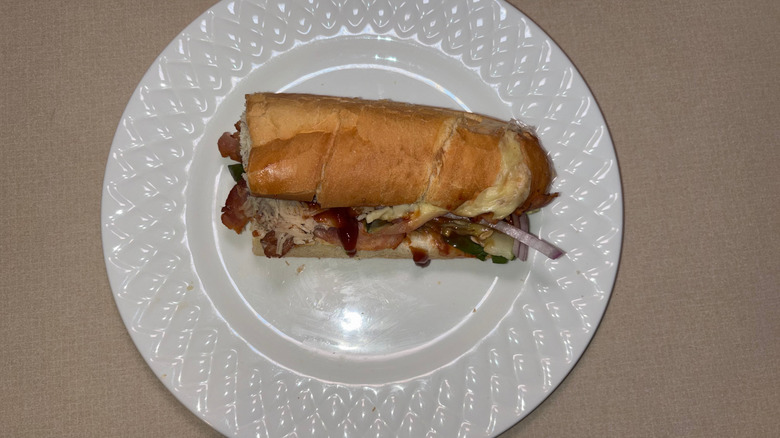 A chicken bacon barbecue sub on white bread.