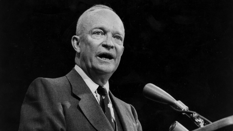 President Dwight D. Eisenhower giving a speech at a podium