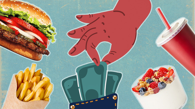 A red hand pinches money from a wallet, with fast food items depicted beside it