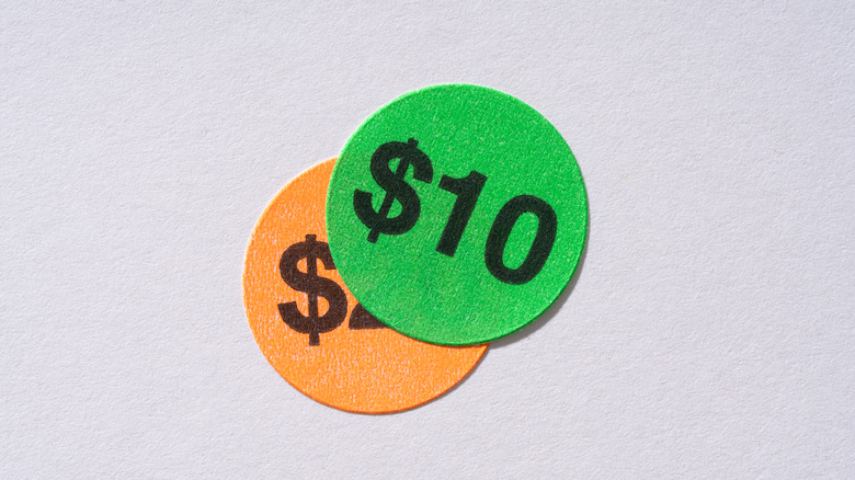 A green $10 price sticker on a white background