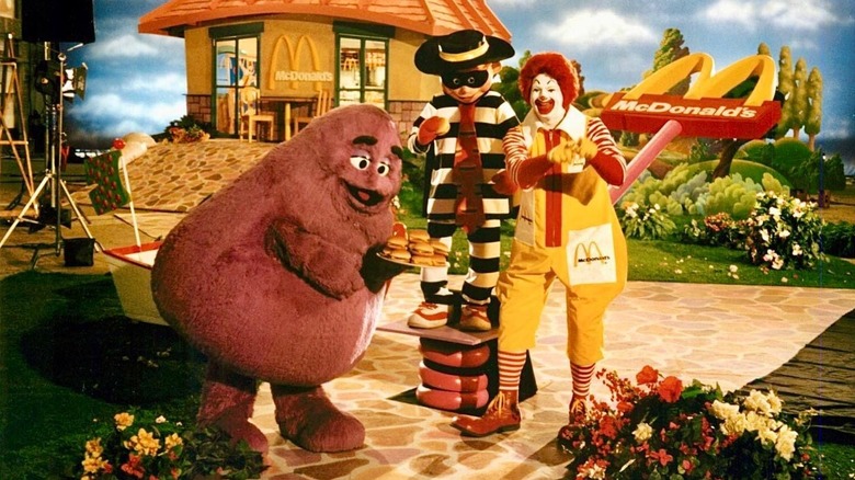 Grimace, the Hamburgler, and Ronald McDonald on a film set