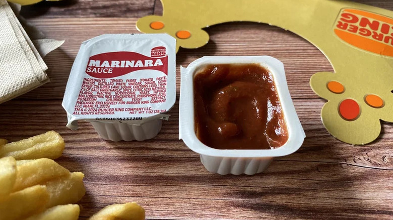 Two packets of Burger King Marinara Sauce