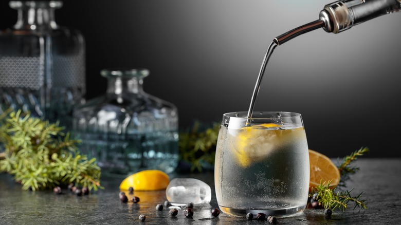 Pouring gin into glass
