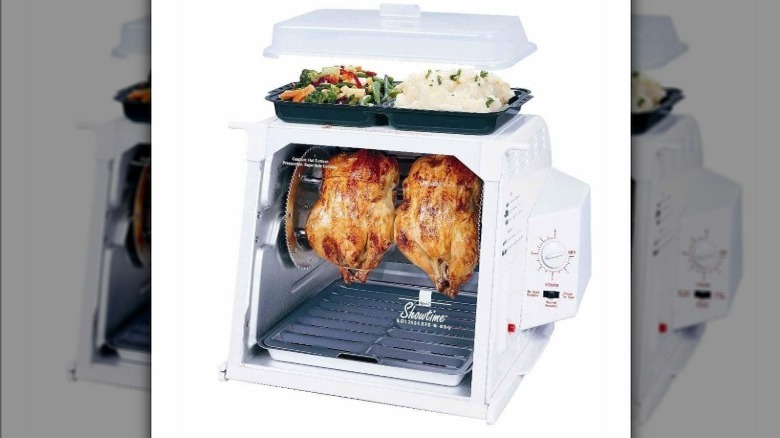 Original Ronco Showtime Rotisserie product photo with two chickens and trays of veggies and potatoes on top