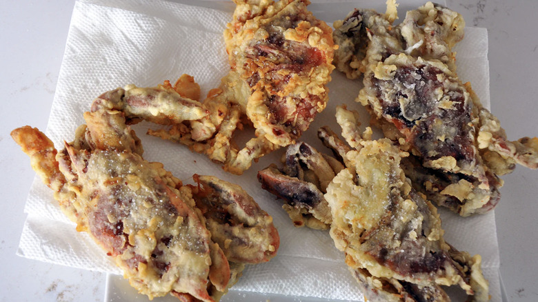 fried soft-shell crabs on paper towel