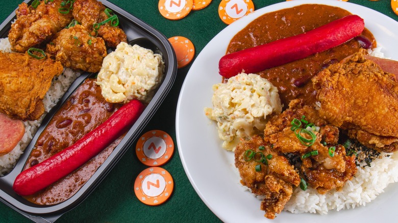top down view of Hawaiian dishes with Zippy's branded poker chips