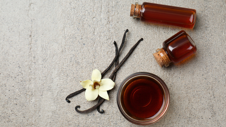 flower with vanilla extract bottles
