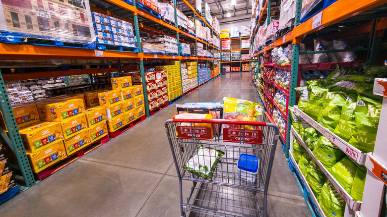 Costco aisle Interior inside Warehouse with Shelves and grocery cart