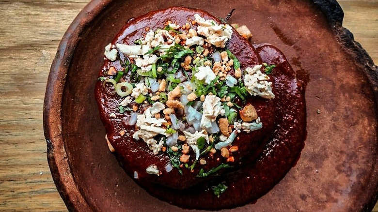 A gordita in adobo sauce at Expendio de Maíz in Mexico City