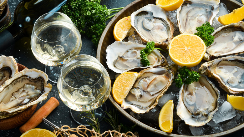 Plate of oysters with wine