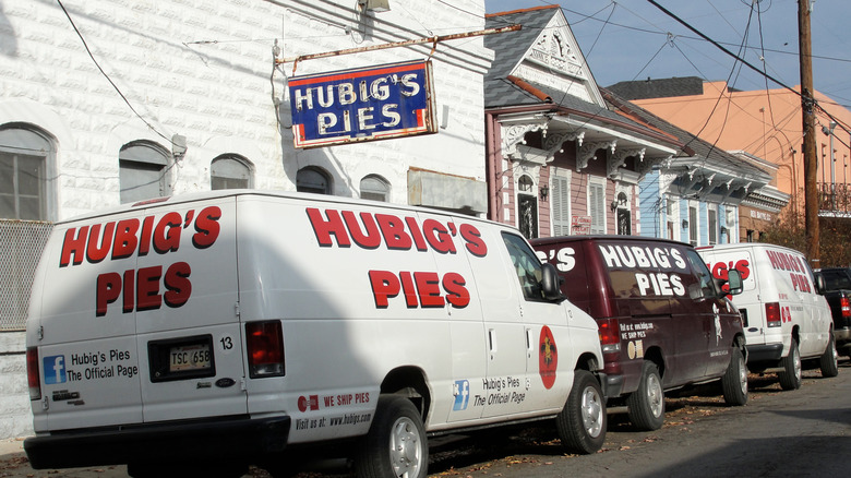 The old Hubig's Pies factory with its vans parked in front of it before it burned down in 2012
